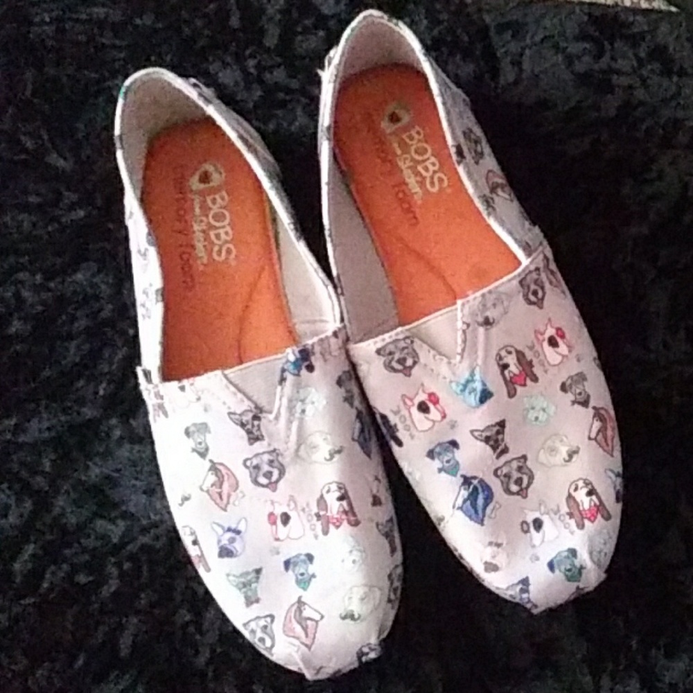 Bob's from Skechers memory foam slip ons. W/ dogs